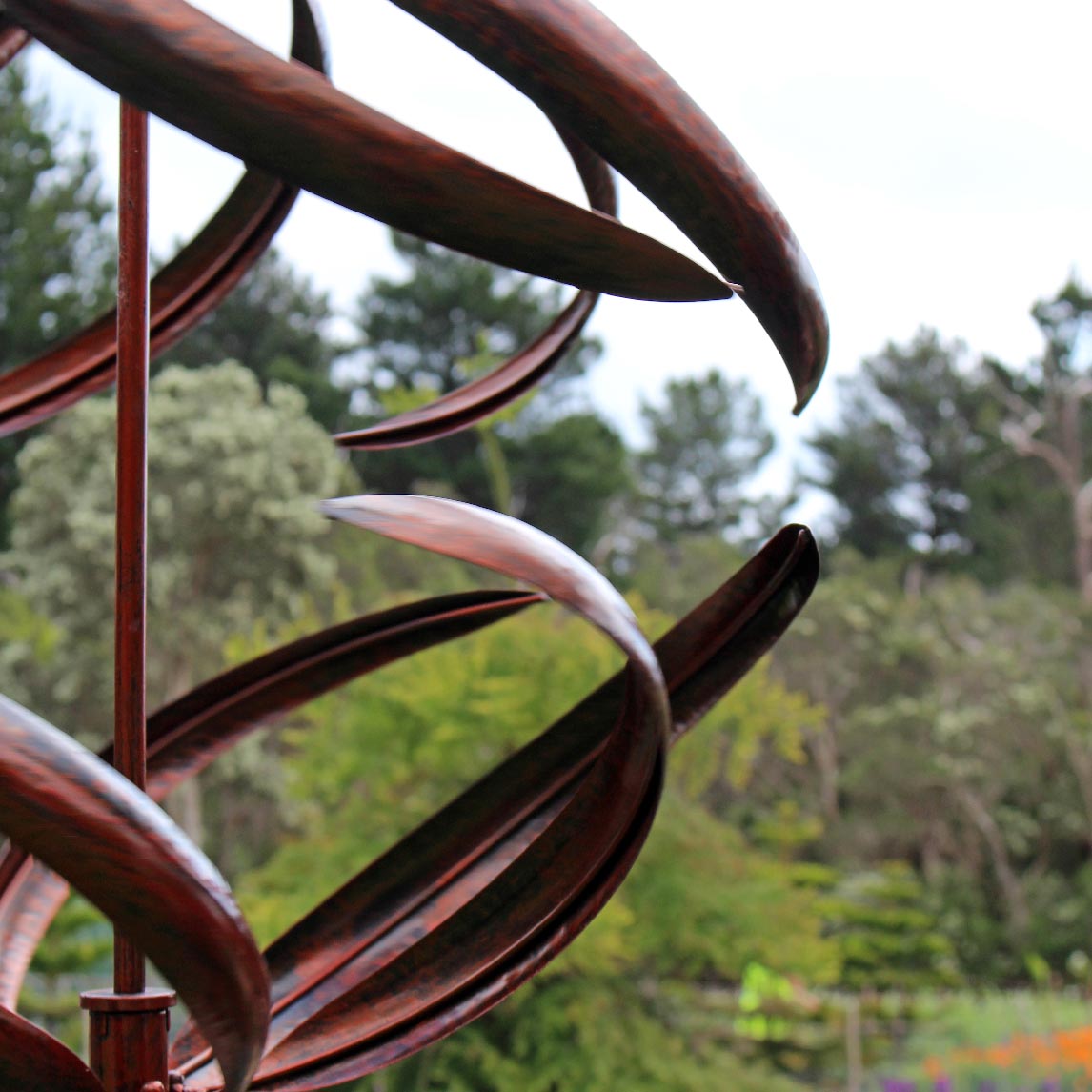 East West Wind Spinner Bronze